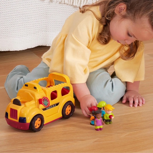 B. Boogie Bus Yellow School Bus
Toy with Lights, Sounds